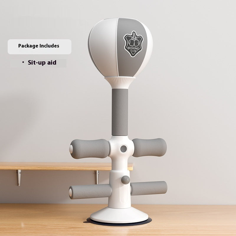 Compact and space-saving sit-up boxing reaction ball standing in a home gym or workout area.